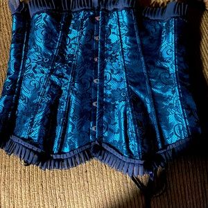 NWOT.  Rouge and Roses made corset and it has never been worn. Colors: teal/blk